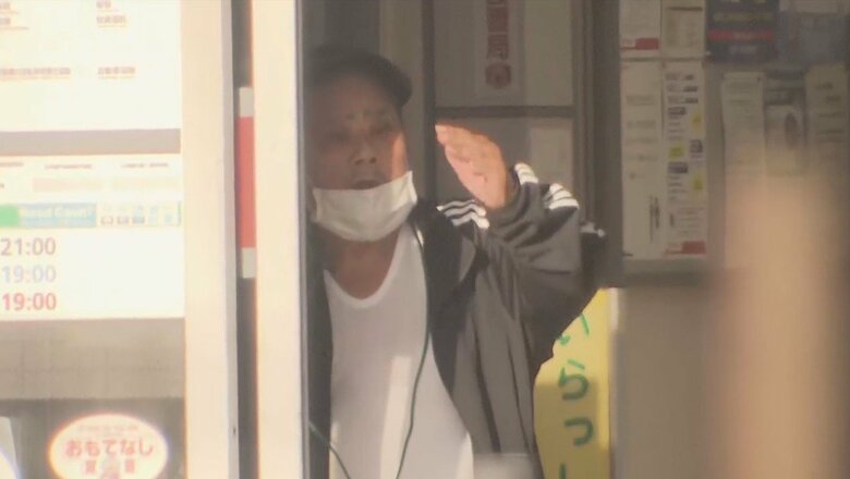 FNNのカメラが捉えた拳銃のようなものを持った鈴木常雄容疑者