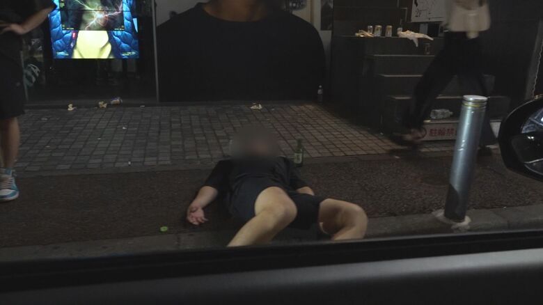 酔っ払って寝込んでしまった人が…