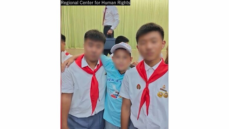 12歳のミーシャさん（写真：中央）