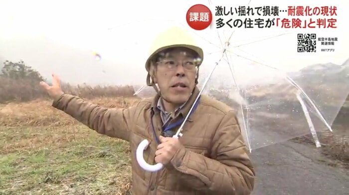 応急危険度判定を行う川合光行建築士