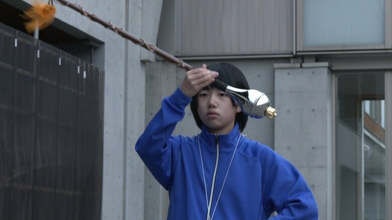 黙々と練習するドラムメジャーの泉湖都子さん