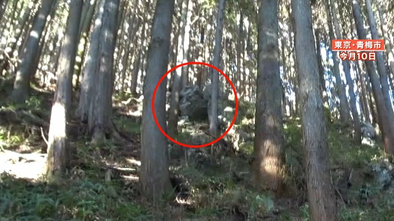 捜索現場には今にも転がり落ちそうな巨大な岩も