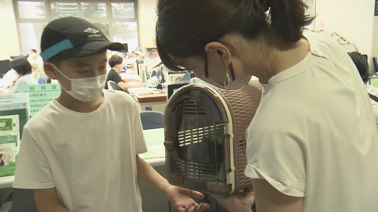 保健所から猫を引き取る萬場さん