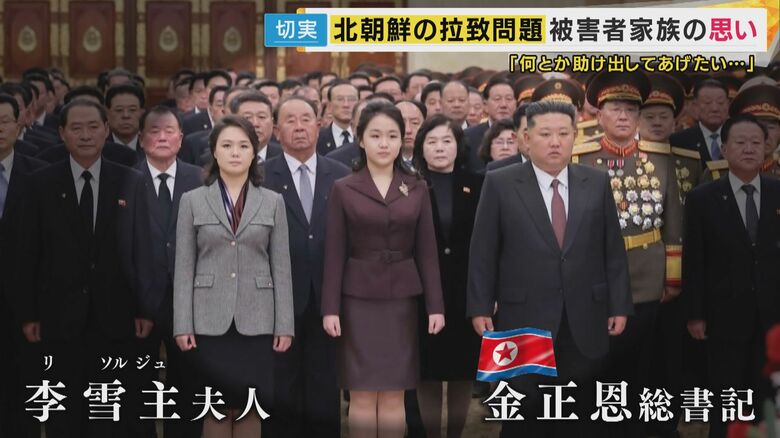 李雪主（リ・ソルジュ）夫人（左）、金正恩総書記（右）の間に写る少女“ジュエ”氏とされる娘