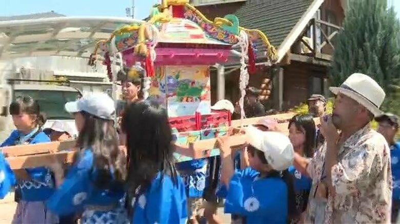 ピンク色でポップなデザインの「子ども神輿」住民と子どもたちの手作り　地域の絆を深めようと始まった「夏祭り」｜FNNプライムオンライン