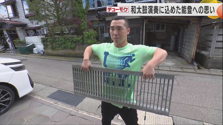 側溝のグレーチングをダンベルがわりに