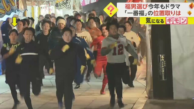 出店のエリアで、集団の中を大きく左側に移動