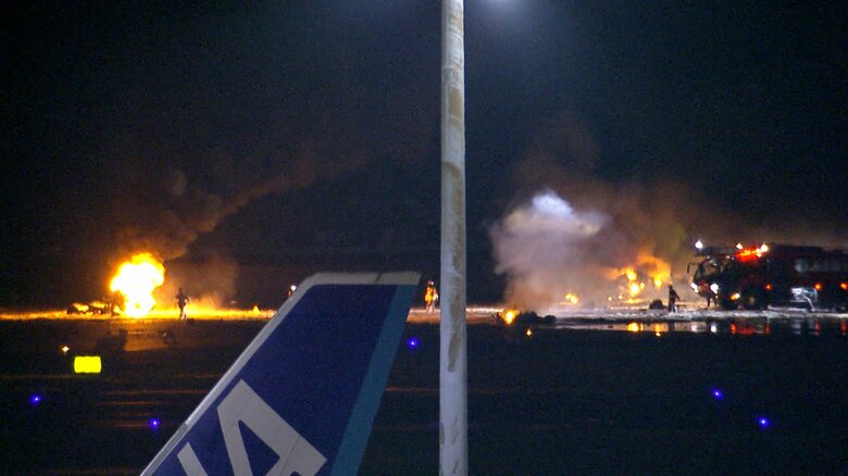 羽田空港で炎上する日航機