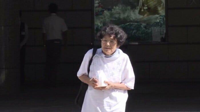 遺骨を引き取った西田好子牧師