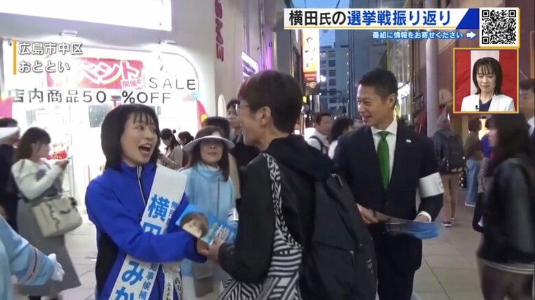 選挙戦の最終日、横田氏と街頭をねり歩く湯崎知事