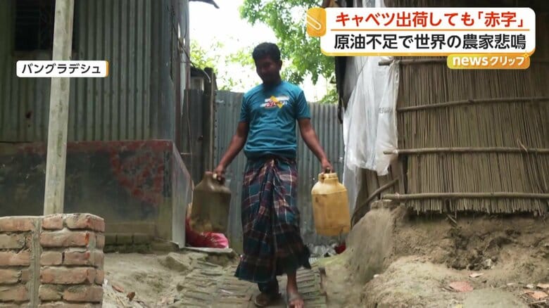 容器を持って給油所に向かった男性
