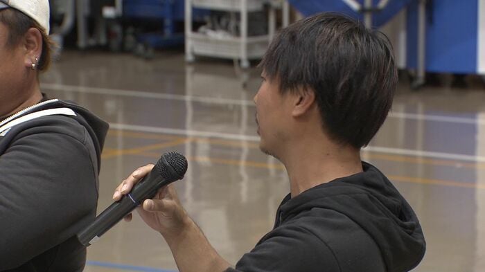 質問をする参加者