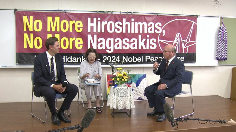 フリードネス委員長と会談する日本被団協の田中重光さん