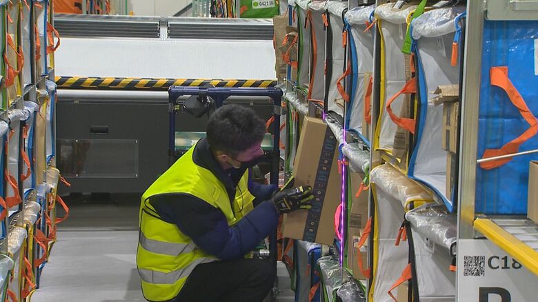 人の手で細かい地域ごとに仕分け