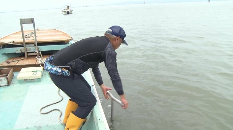 棒を海底に入れる