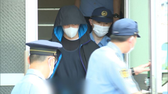 送検される佐藤蓮真容疑者(5月18日) ※画像は一部加工
