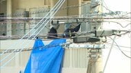 沖縄・宜野湾市アパートで23歳の女性が首から血を流し死亡　事件に関与したとみられる男の身柄確保、刃物を押収