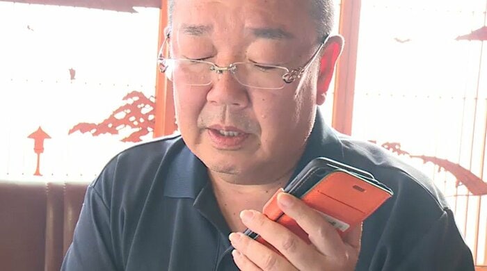 棄却の連絡を電話で受ける遠藤市議