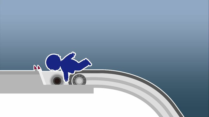 転倒した際に右腕や服が機械に巻き込まれた