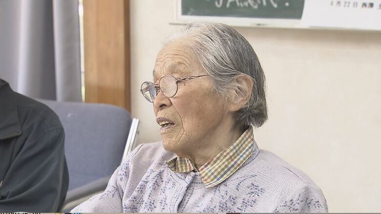 証言する田中さん