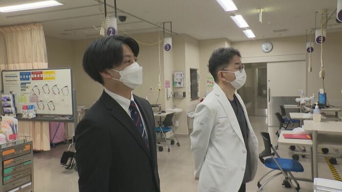 紹介される奥池さん