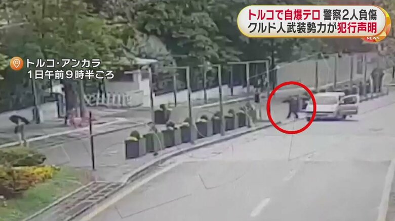 銃を撃ちながら、建物に近づいていく