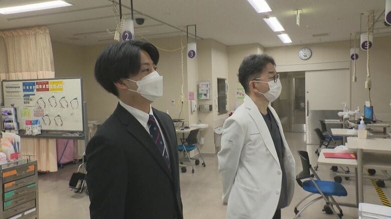 紹介される奥池さん