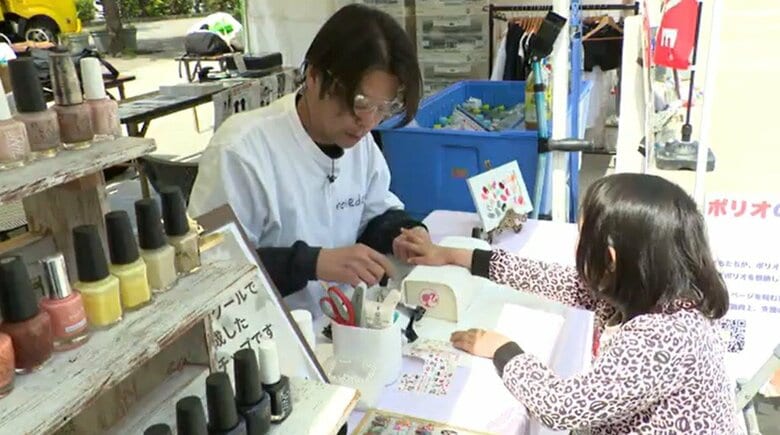 佐藤さんはこのイベントで初めて一般のお客さんに施術を行った