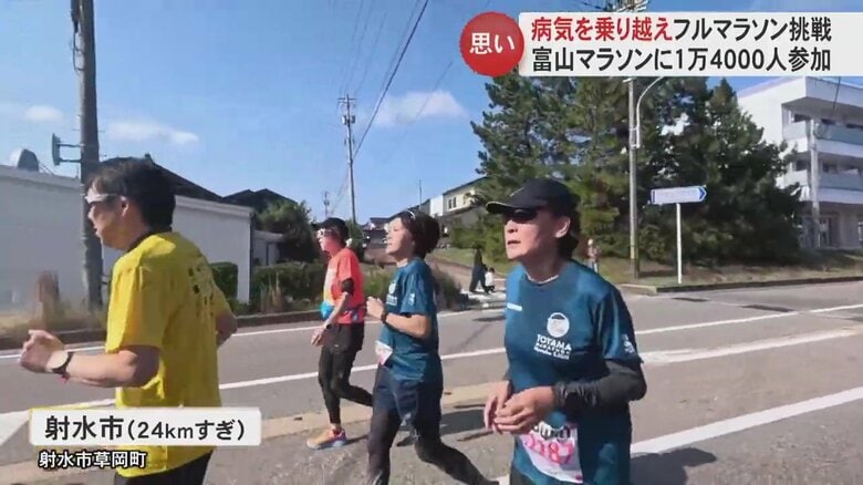 暑い中走る杉森さん親子