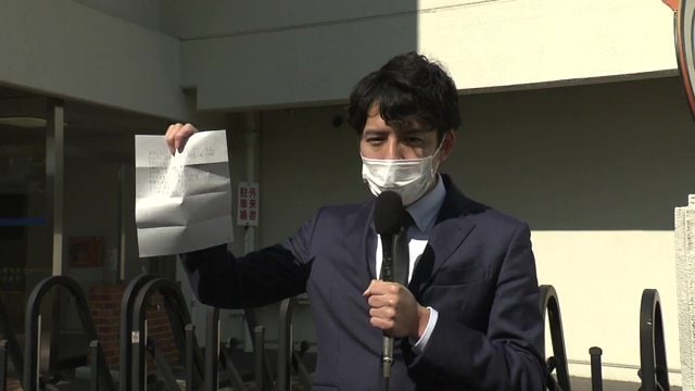 接見へ向かう福島テレビ・矢崎記者