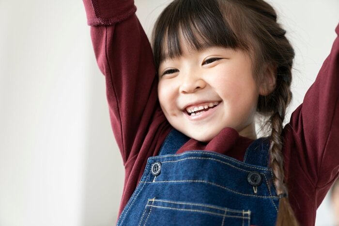 笑顔と楽しい思い出をつくるという信念で子育てしたという(画像:イメージ)