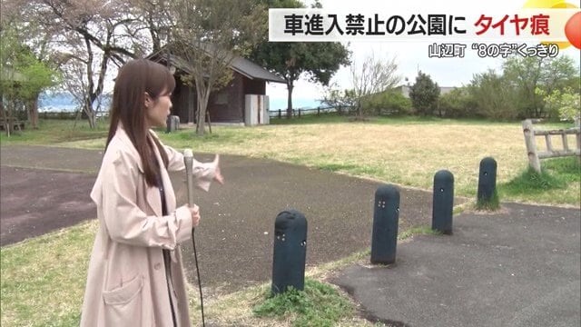 車の侵入を禁じる「タイヤ止め」のわき（記者の左わき）をすり抜け侵入か