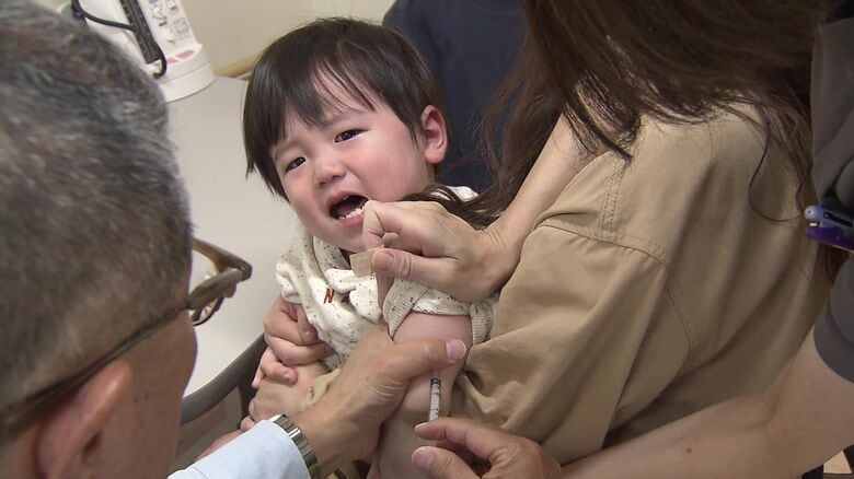 ワクチンを接種する子ども