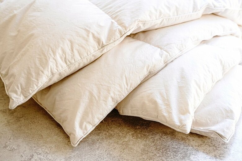 羽毛布団などは注意が必要（イメージ）