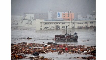 「自分を殺し、心を殺した」写真家の苦悩　津波に飲み込まれたあの日、なぜ彼は撮り続けたのか