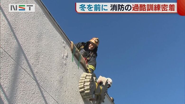 ホースを建物の上部へ