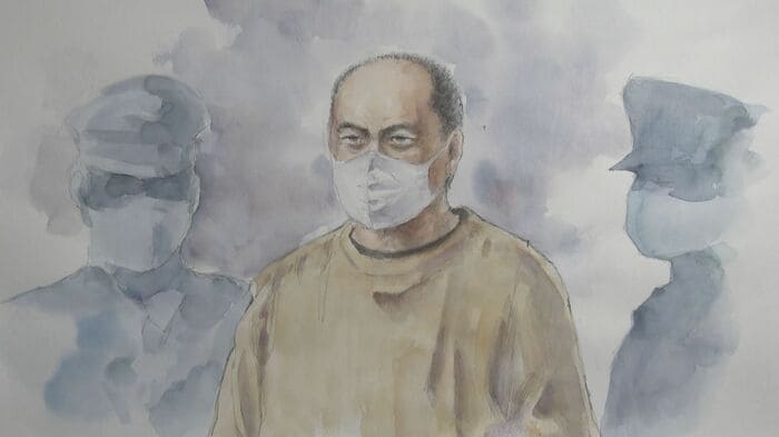 頭を丸刈りにして法廷に姿を見せた尾張被告