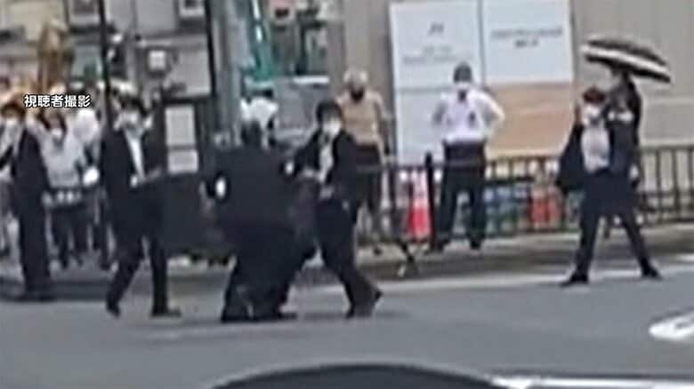 取り押さえられる山上徹也容疑者