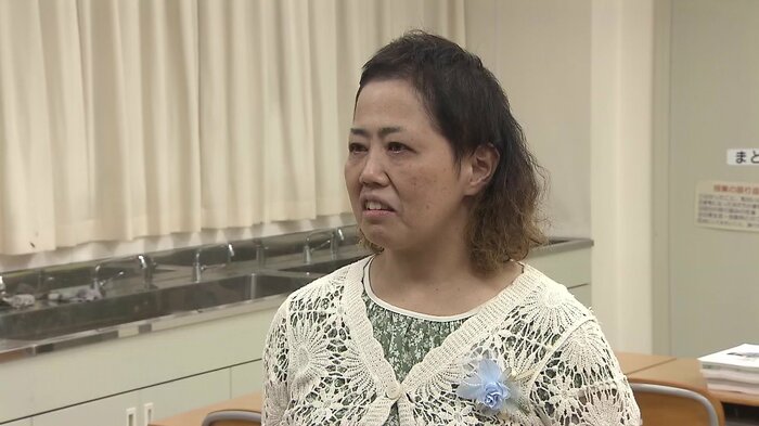 インタビューに応じる白川さん
