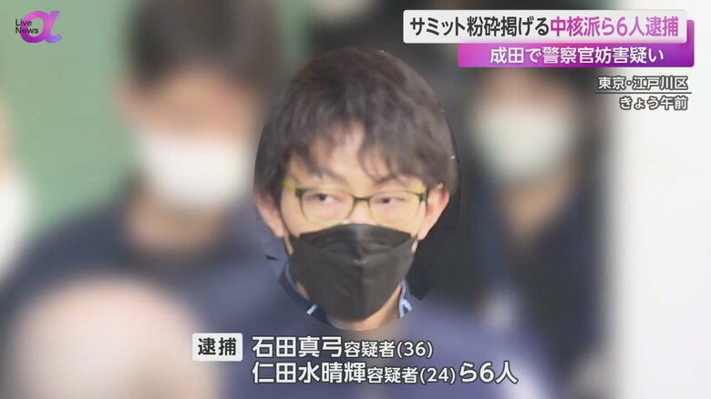 連行される石田真弓 容疑者(36)(東京・江戸川区 11日午前)