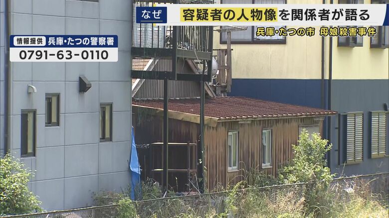 左の灰色っぽい家が被害者宅　隣の家に大山容疑者がかつて住んでいたという