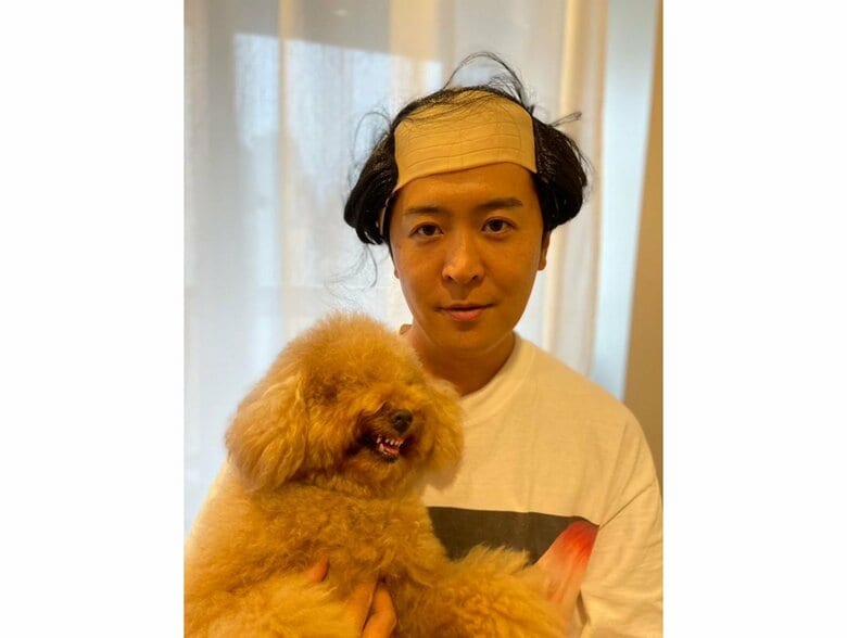 パパの抱っこに嫌がるぴん太郎くん（提供：ピン太郎ママさん）