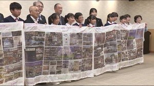 復興を宇宙から伝える横断幕<福島県川俣町>