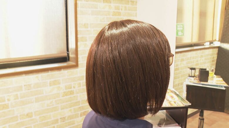 ウィッグをつけた高橋さん