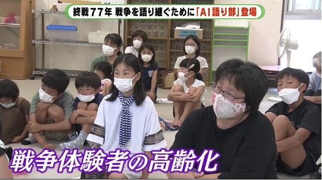 話に聞き入る子供や保護者