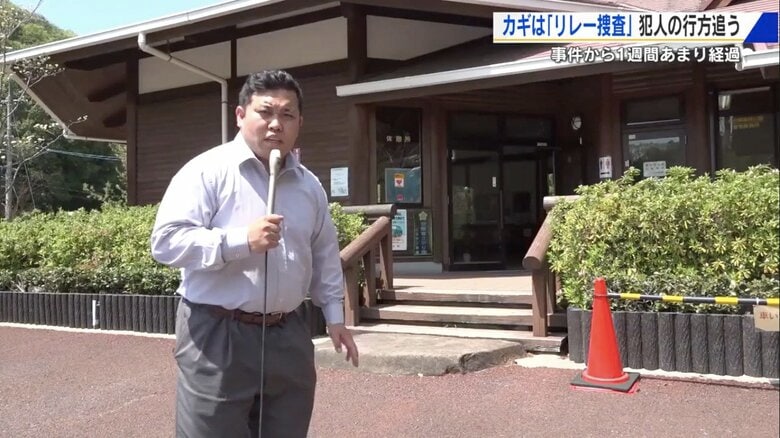 事件現場から報告する竹内研二記者