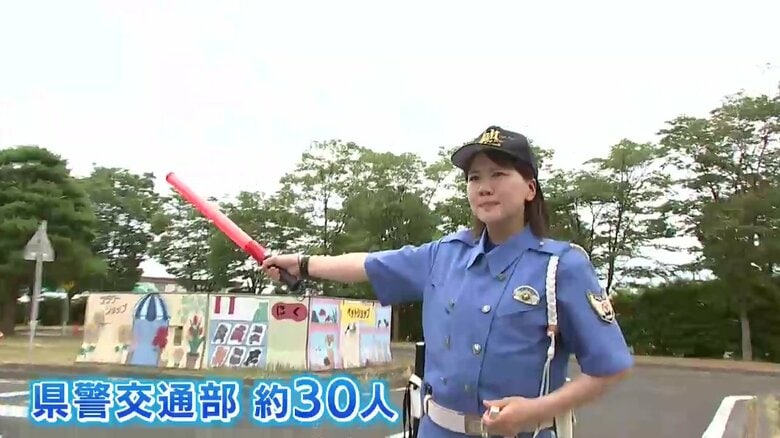 岩手県警交通部の職員約30人が参加して撮影