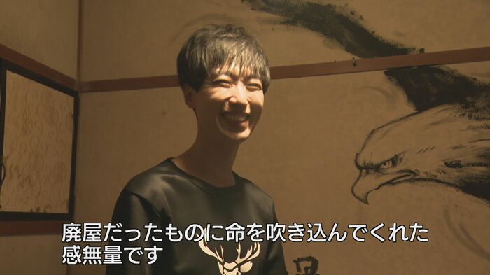 笑顔で話す小川さん