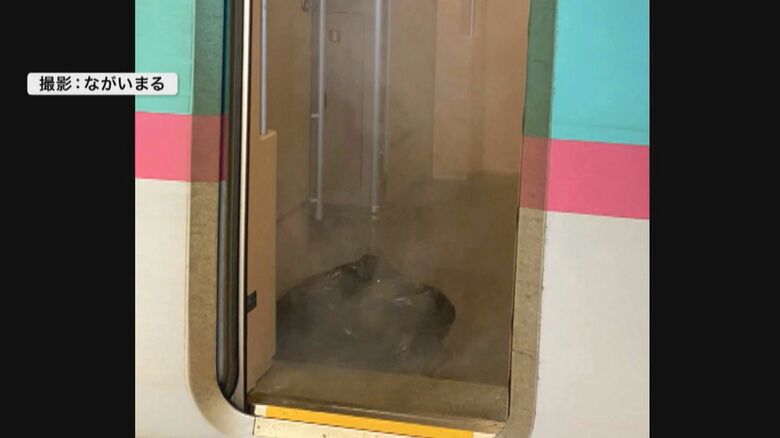 バッグからあがる煙　撮影：ながいまる