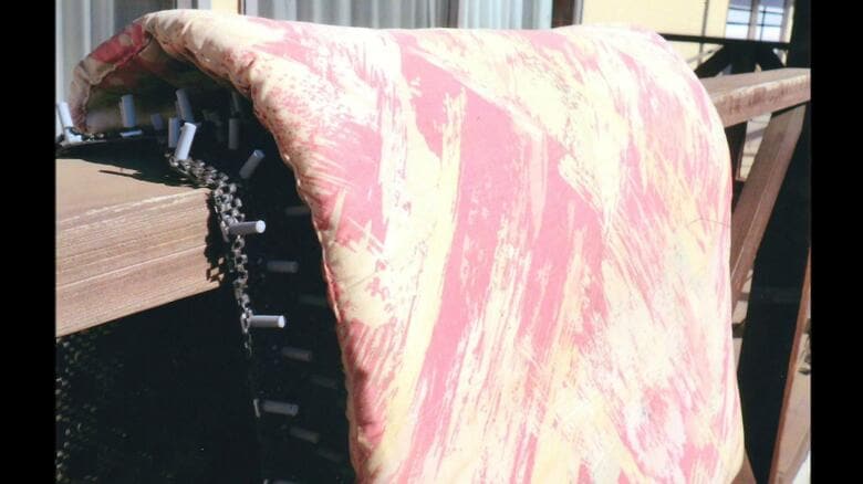 「物干し補助具」使用例（提供：婦人発明家協会）